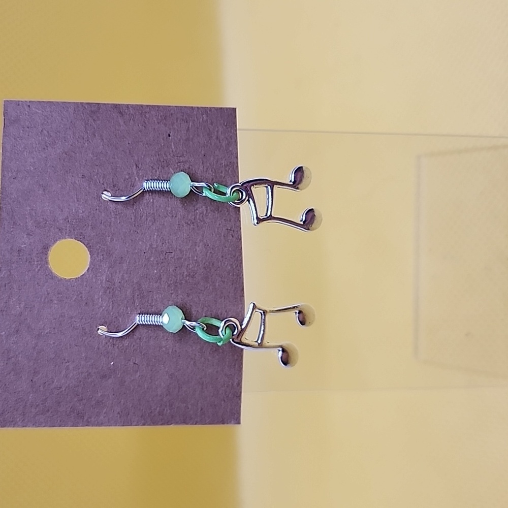 Green music note earrings